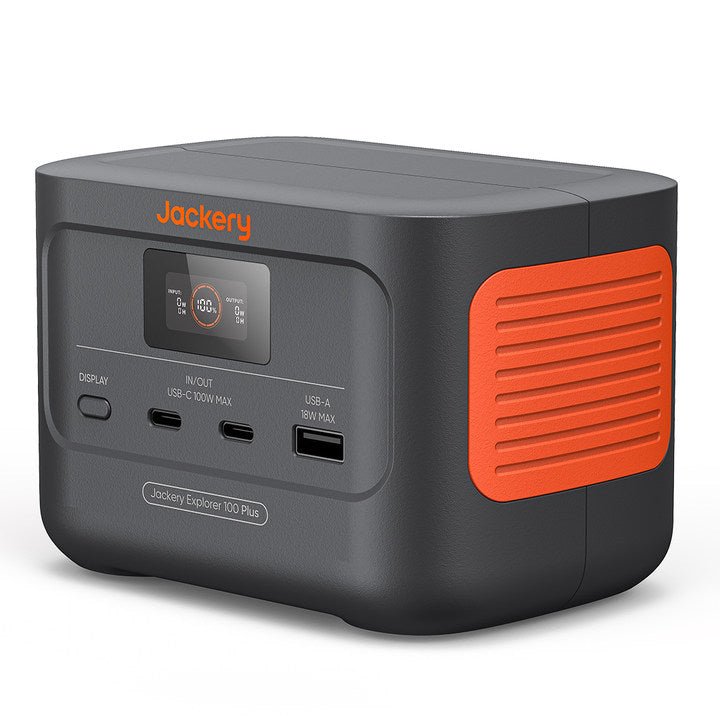 Large portable power station with orange ventilation panel on the side, digital display screen, and multiple charging ports